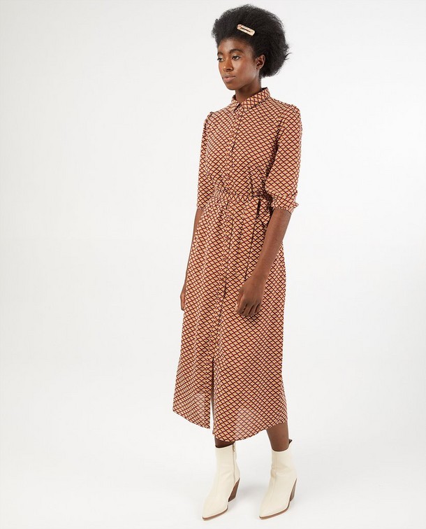Brillez avec cette robe chemisier Brillez avec cette robe chemisier